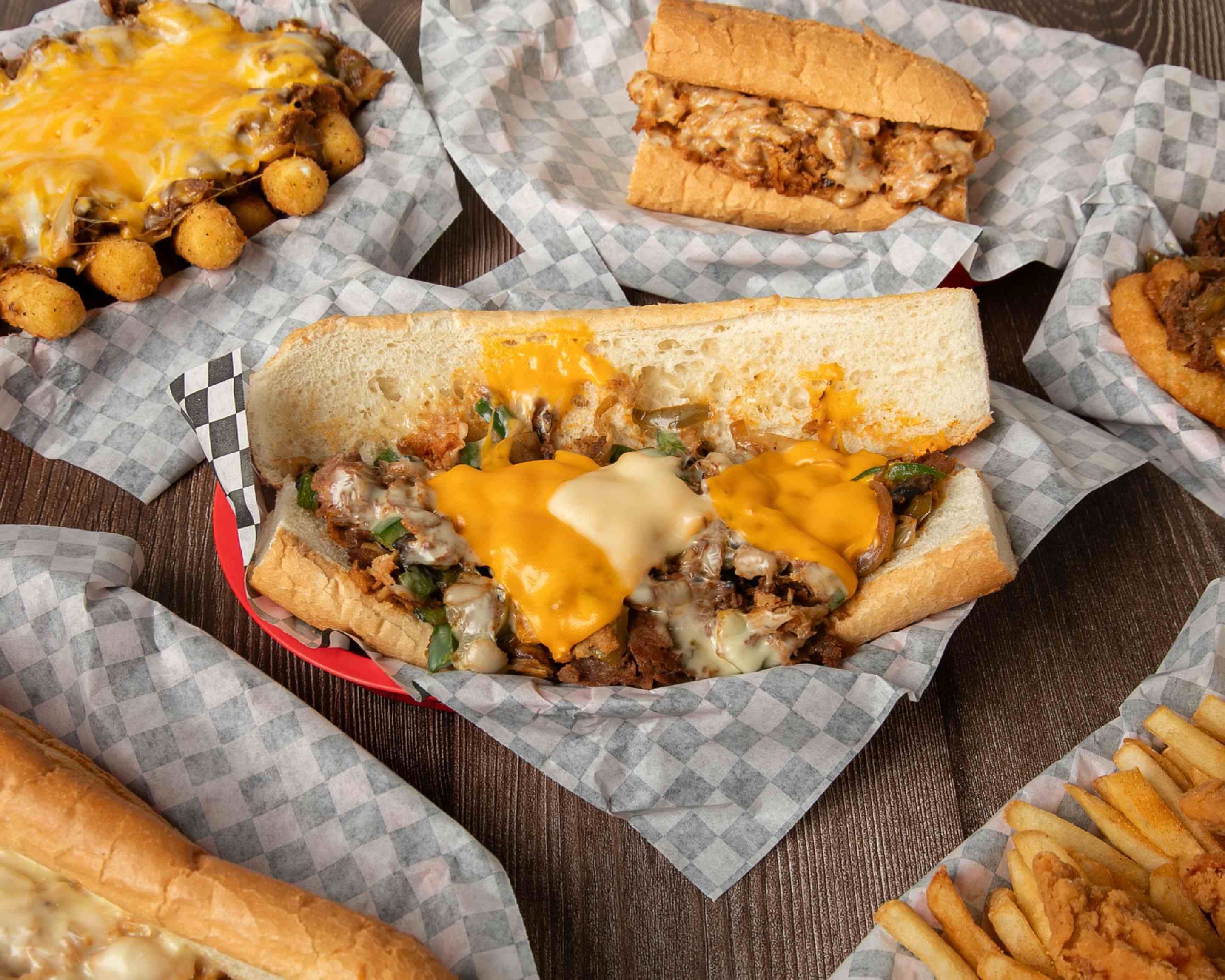 Steakzilla cheesesteaks, fries, and loaded sides